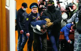 Jeden z podejrzanych w moskiewskim sądzie. 24 marca 2024 r. 